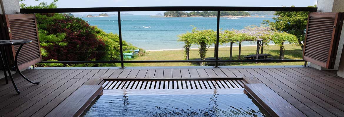 Guest room open-air bath overlooking the sea and islands of Matsushima